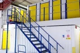 Modern storage facility with organized units and clear blue sky